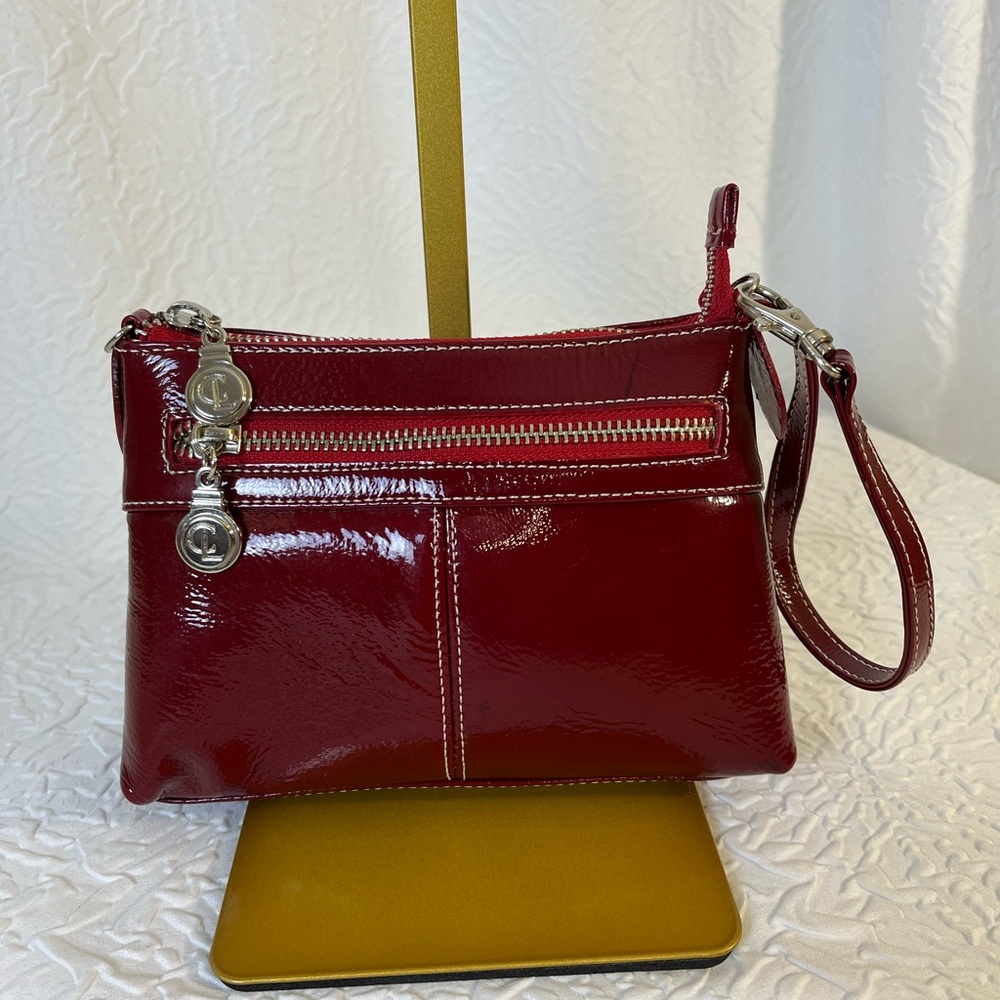 Others Follow Red Leather Wristlet with Structured Design